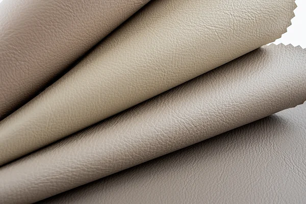 Surface grain and folds representing coating applications for flexible sheet materials